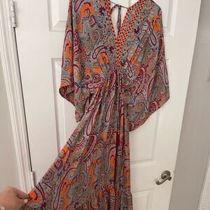 Stylish and breezy bohemian dress that combines comfort with a chic modern flair